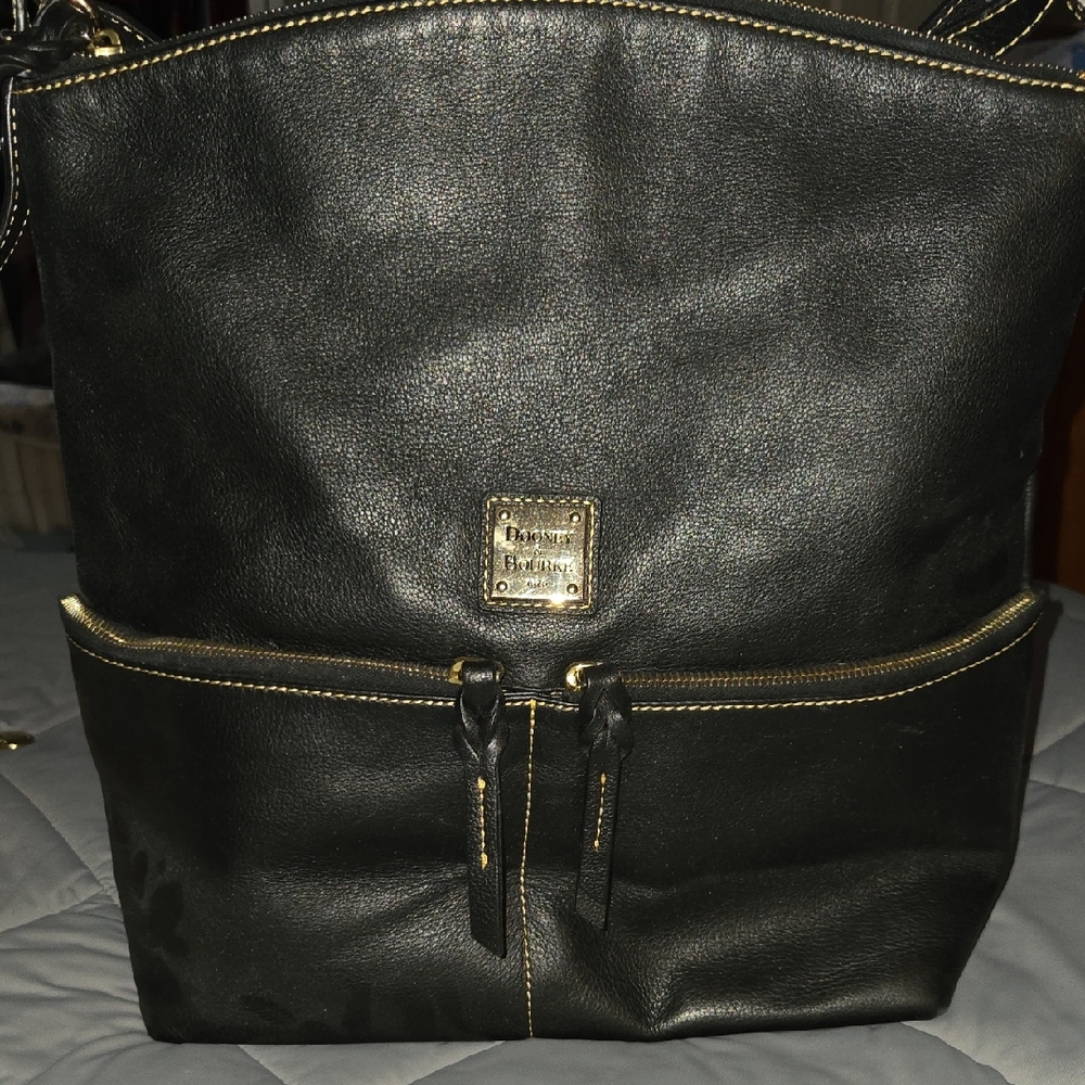 Dooney & Bourke black pebbled leather hobo bag featuring Silver Hardware